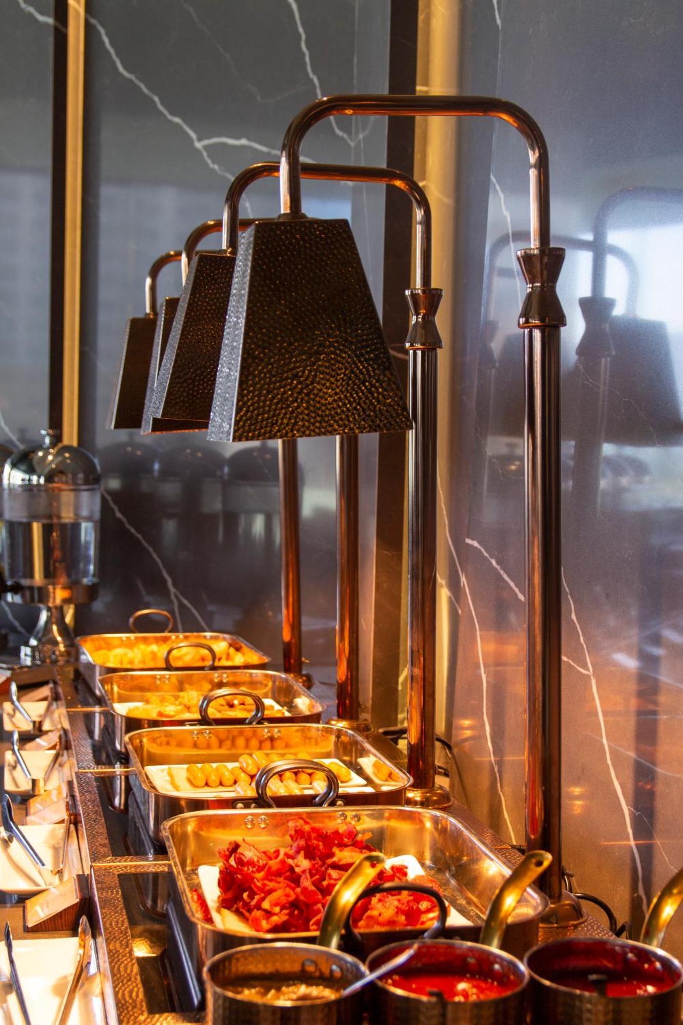M Hotel Danang Exterior foto A chafing dish